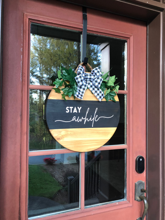 Stay Awhile Sign With Black Buffalo Plaid Bow and Greenery