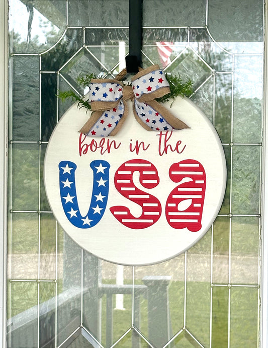 Born in the USA Wood Sign with Red White Blue Bow